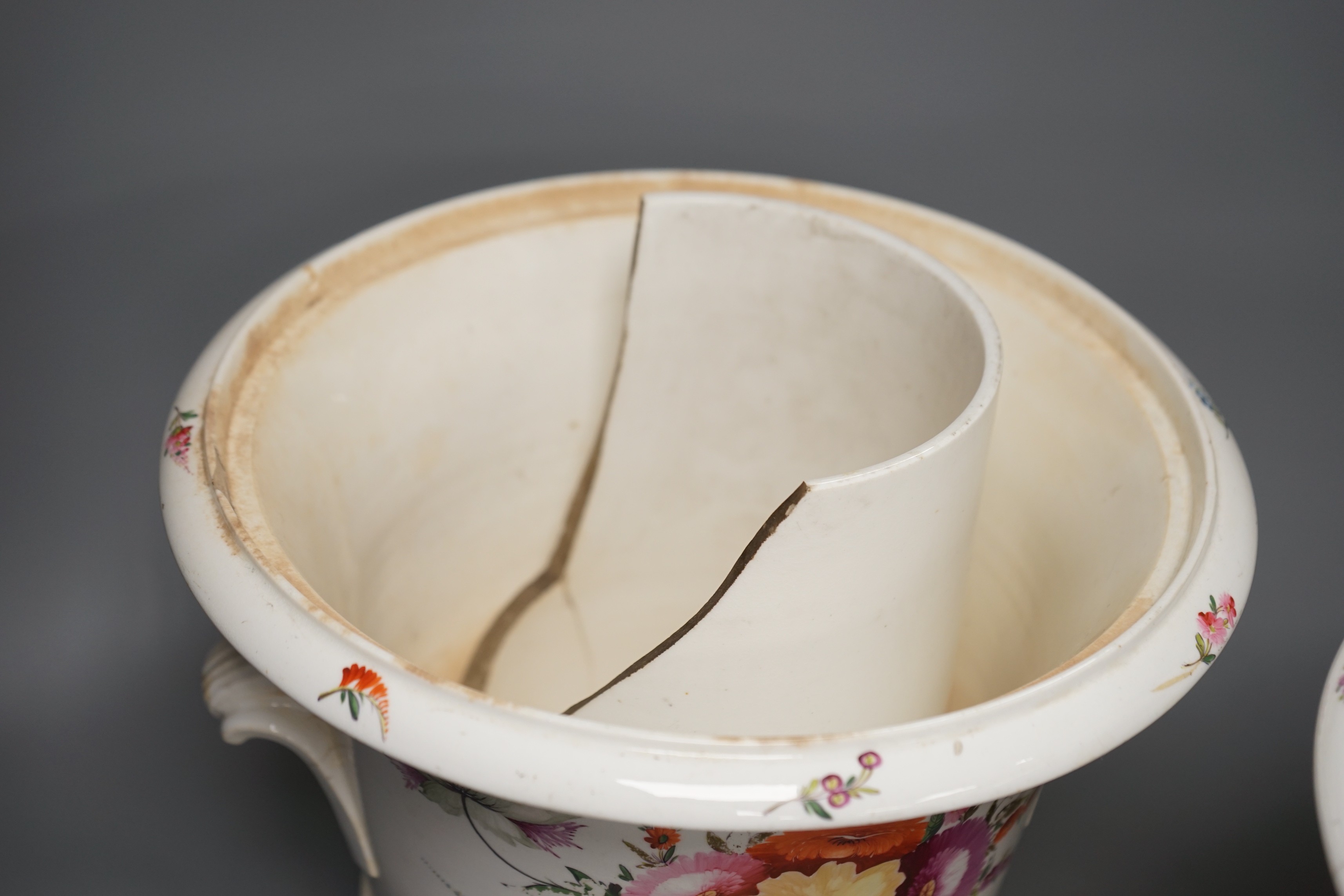 A pair of early 19th century Coalport floral painted ice pails, 29cm